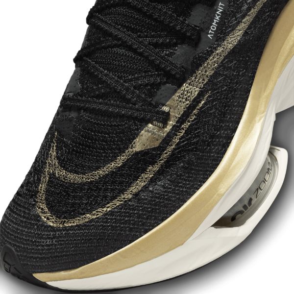 Nike-Air-Zoom-Alphafly-Next%-2-Womens-Shoe-Black/ Metallic-Gold-Grain-Sail-Blue-Mountains-Running-Co